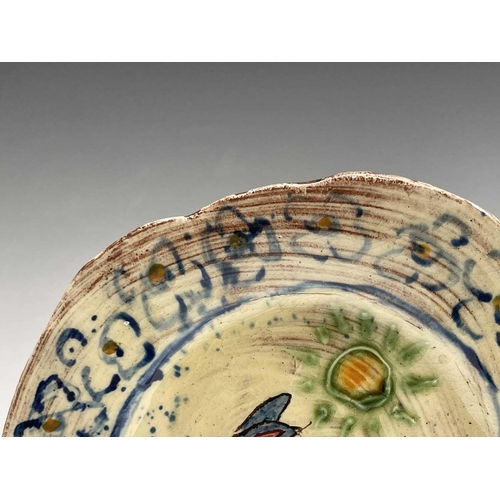 957 - A Ben Fosker (b.1960) slip decorated earthenware plate painted with a running hare, painted 'B' mark... 