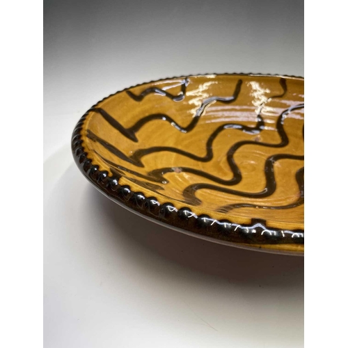 960 - A John Reeve (1929-2012, ex Longlands Pottery, Hennock, Devon, c. 1968-1970) slip decorated earthenw... 