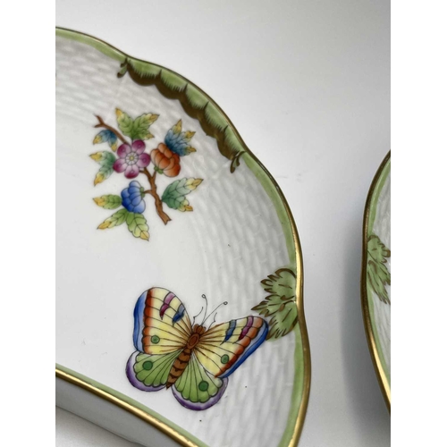 963 - Four Herend Queen 'Victoria Green' pattern crescent plates decorated with butterflies and floral spr... 