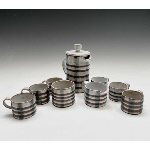 964 - A Briglin studio pottery tea set, comprising of six cups, a milk jug, a sugar bowl and a teapot.