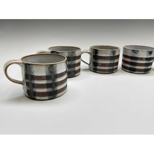 964 - A Briglin studio pottery tea set, comprising of six cups, a milk jug, a sugar bowl and a teapot.