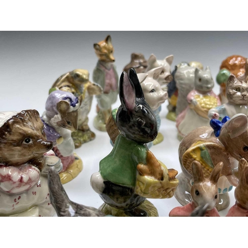 973 - A collection of twenty-eight Royal Albert Beatrix Potter figures (box).