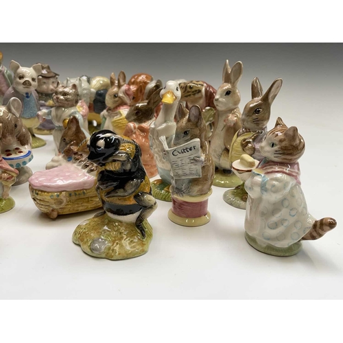 973 - A collection of twenty-eight Royal Albert Beatrix Potter figures (box).