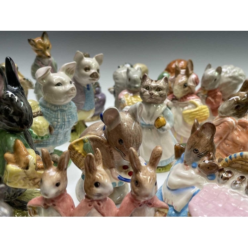 973 - A collection of twenty-eight Royal Albert Beatrix Potter figures (box).