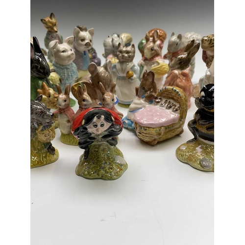 973 - A collection of twenty-eight Royal Albert Beatrix Potter figures (box).