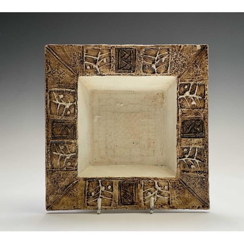 974 - A Troika pottery square dish, the coffee coloured rim with incised decoration, 16.5cm square, togeth... 