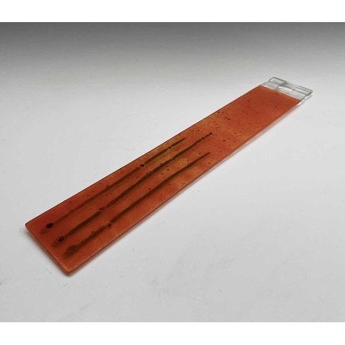 977 - Three studio glass panels, with streaked orange colouring, height 6.5cm (3).