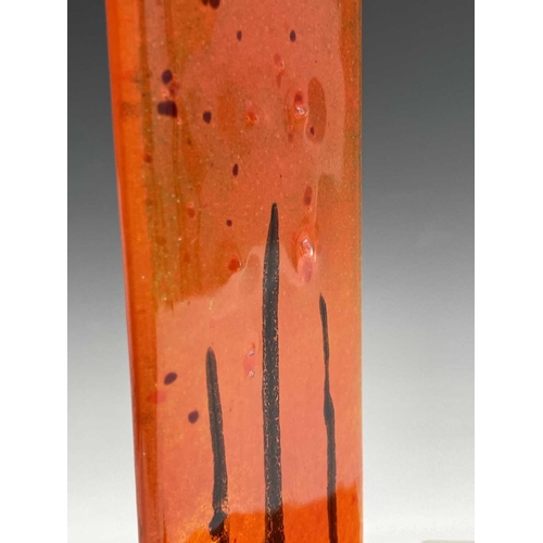 977 - Three studio glass panels, with streaked orange colouring, height 6.5cm (3).