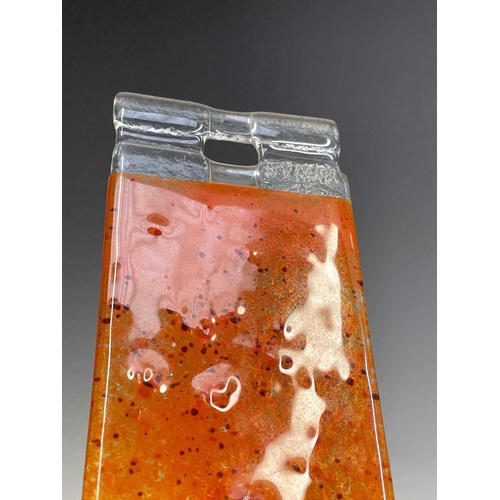 977 - Three studio glass panels, with streaked orange colouring, height 6.5cm (3).