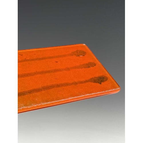 977 - Three studio glass panels, with streaked orange colouring, height 6.5cm (3).