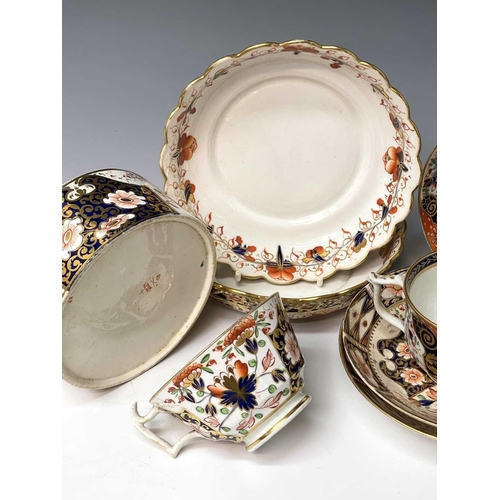 980 - Three Derby porcelain coffee cans and saucers, circa 1820, painted in iron red, blue, green and gilt... 