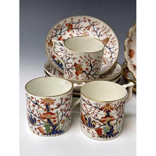 980 - Three Derby porcelain coffee cans and saucers, circa 1820, painted in iron red, blue, green and gilt... 