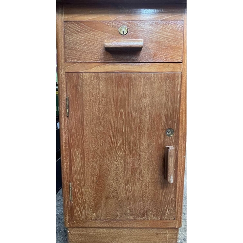 3084 - A teak pedestal desk, fitted with an arrangement of six drawers and a cupboard. Height 75cm, width 1... 