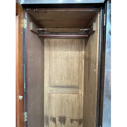 3218 - A Victorian mahogany triple wardrobe.