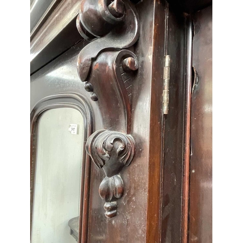 3218 - A Victorian mahogany triple wardrobe.