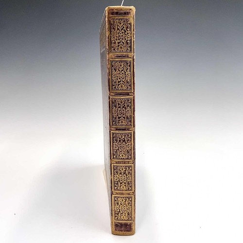 101 - Late 19th century note book, bound in maroon Morocco with ostentatious gilt border and spine, cracki... 