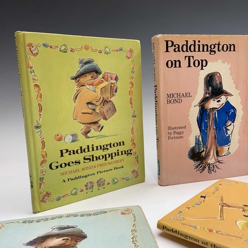 138 - MICHEAL BOND. 'Paddington on Top,' first edition, unclipped dj, slight tearing and tide mark to top ... 