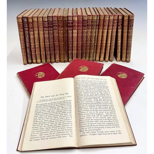 182 - RUDYARD KIPLING. Twenty-eight MacMillan pocket editions, all bound in red leather with gilt embossed... 