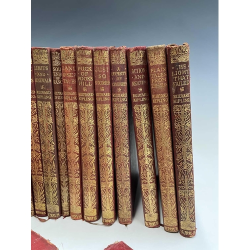 182 - RUDYARD KIPLING. Twenty-eight MacMillan pocket editions, all bound in red leather with gilt embossed... 