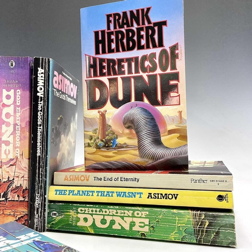 186 - SCIENCE FICTION. The Foundation trilogy by Isaac Asimov and Dune by Frank Herbert with classic cardb... 