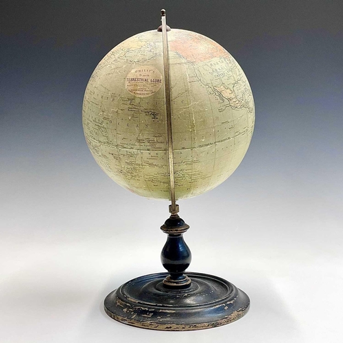 10 - A Philip's 9 inch, terrestrial globe, on a turned ebonised stand, overall height 38cm.