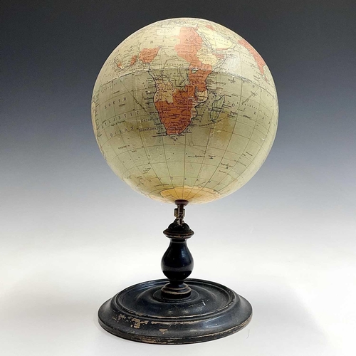 10 - A Philip's 9 inch, terrestrial globe, on a turned ebonised stand, overall height 38cm.