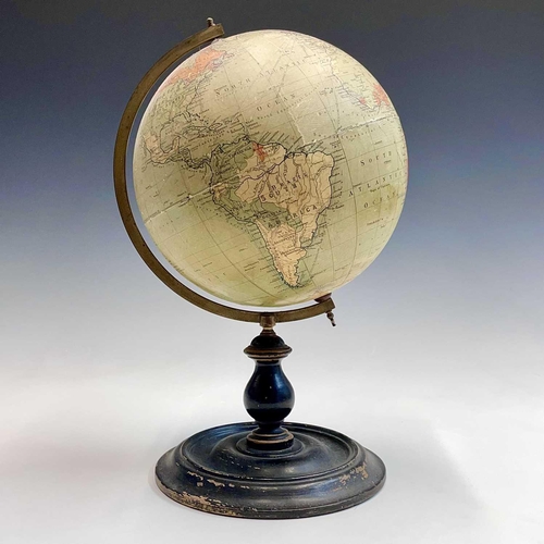 10 - A Philip's 9 inch, terrestrial globe, on a turned ebonised stand, overall height 38cm.