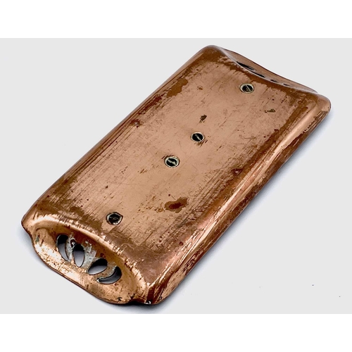 101 - An Aesthetic Movement copper inkstand, circa 1900, with pierced grips and fitted two copper topped g... 