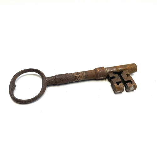 106 - A 19th century iron door lock and key the oak frame stamped Keep & Hinkley, together with another si... 