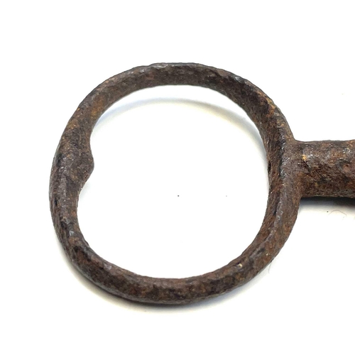 106 - A 19th century iron door lock and key the oak frame stamped Keep & Hinkley, together with another si... 