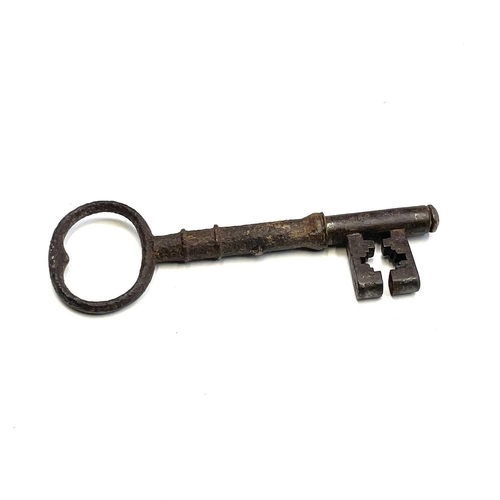 106 - A 19th century iron door lock and key the oak frame stamped Keep & Hinkley, together with another si... 