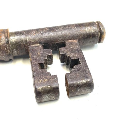 106 - A 19th century iron door lock and key the oak frame stamped Keep & Hinkley, together with another si... 