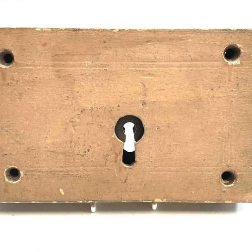 106 - A 19th century iron door lock and key the oak frame stamped Keep & Hinkley, together with another si... 