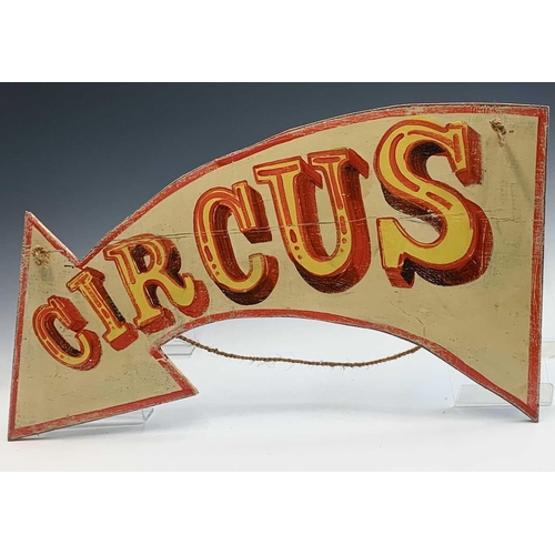 108 - A painted directional Circus sign, width 77cm.