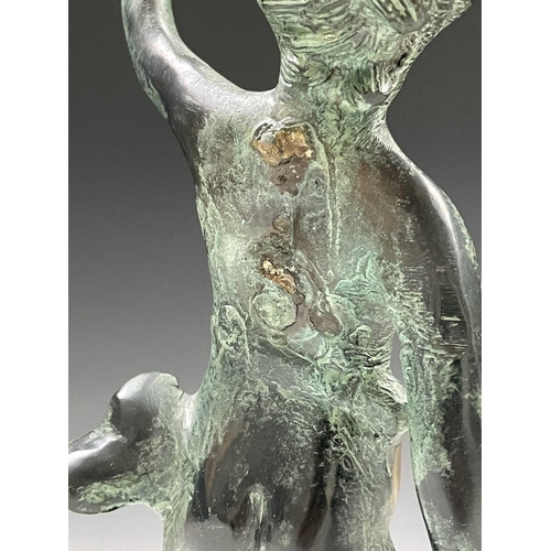 113 - A cast metal figure of putto indistinctly signed to base, height 34cm.