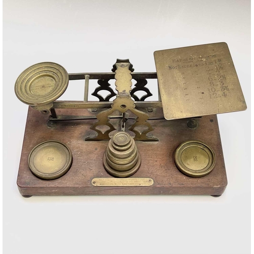 116 - A set of S.Mordan & Co brass parcel scales and weights, circa 1900, with engraved postal rates and a... 