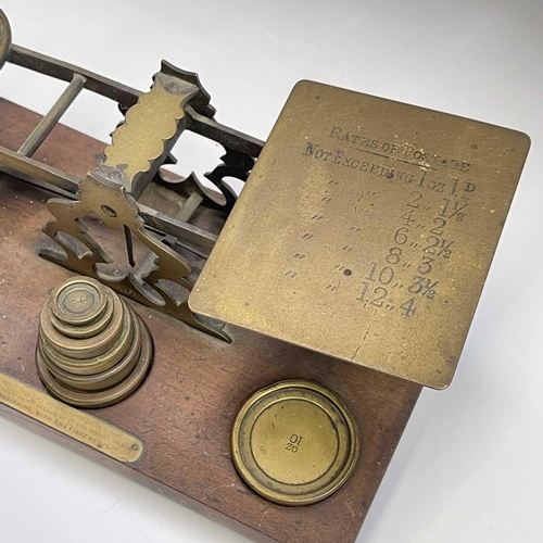 116 - A set of S.Mordan & Co brass parcel scales and weights, circa 1900, with engraved postal rates and a... 