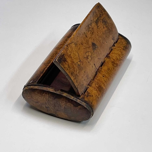 119 - A Victorian amboyna large snuff box, with wood hinge and inset shield, width 13.6cm.