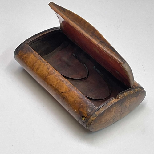 119 - A Victorian amboyna large snuff box, with wood hinge and inset shield, width 13.6cm.