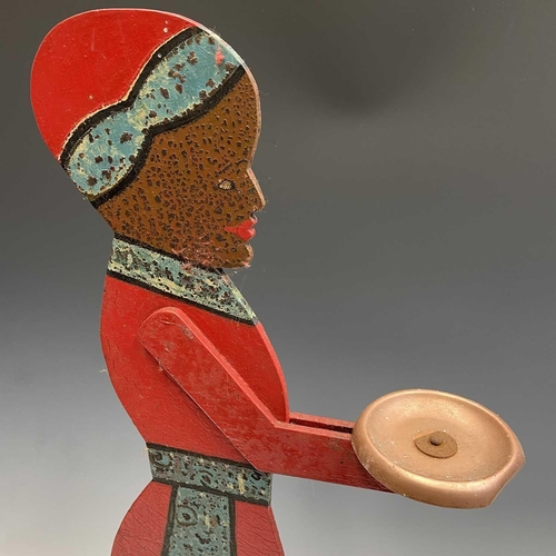 120 - A figural painted wood dumb waiter. Height 77cm.