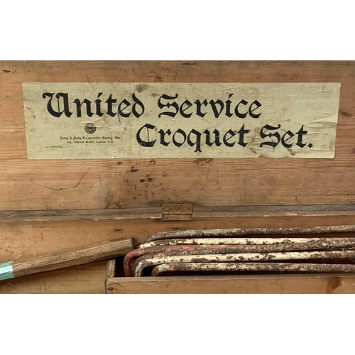 128 - An early 20th century United service croquet set, Army and Navy co-operative LTD 105 Victorian St Lo... 