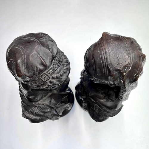 129 - A pair of 20th century bronze busts of a Moorish male and female, after Buese on pedestal bases, bot... 