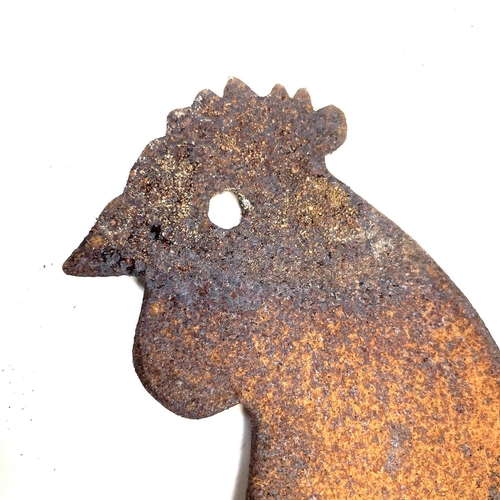 133 - A sheet metal weather vane mount in the form of a hen. Overall height 48cm.