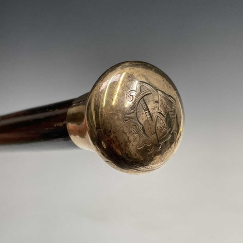 134 - A gentleman's cane, with engraved 9ct gold handle, length 89cm.