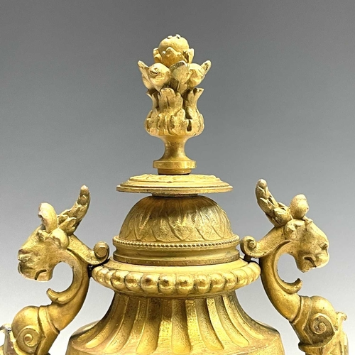 137 - A pair of French gilt spelter cassolette, circa 1890, stamped P.H.Mourey, with reversible covers/can... 