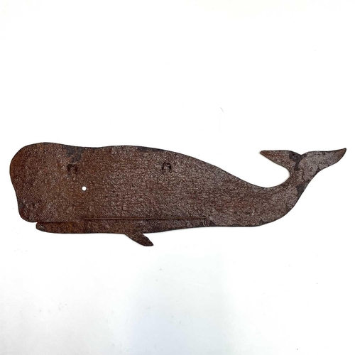 139 - A sheet metal wall hanging in the form of a whale. Height 14.5cm, width 44cm.