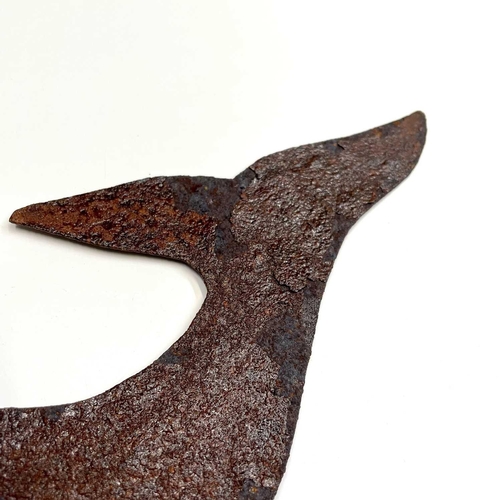 139 - A sheet metal wall hanging in the form of a whale. Height 14.5cm, width 44cm.