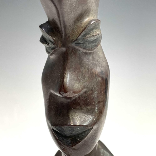 140 - A pair of central African heavy hardwood carved busts, as a male and female, height 38.5cm.