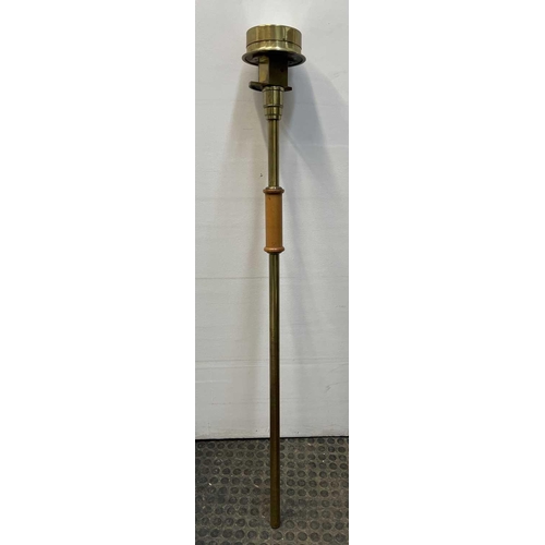 148 - A Bailey's patent brass pyrometer, the enamel dial stamped Albion /works, Salford, length 106cm.