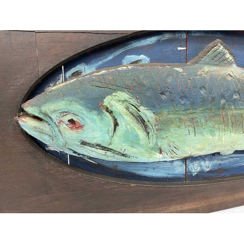 158 - A wood carved and painted high relief sculpture of a fish mounted onto a repurposed Edwardian wardro... 